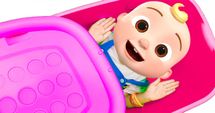Happy Baby Chillin' in a Pink Basket!